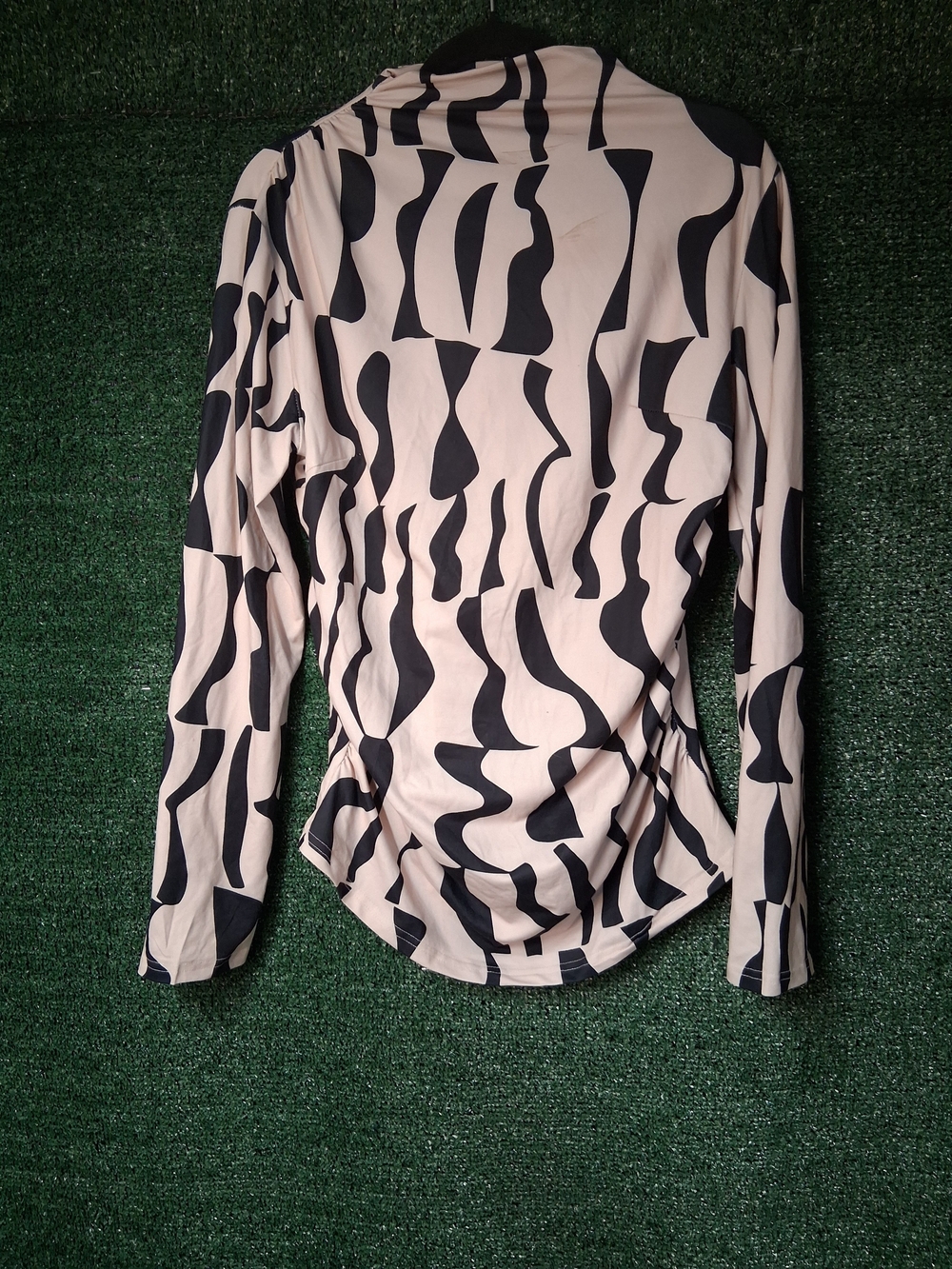 Long-Sleeve Cream Top with Bold Black Abstract Print